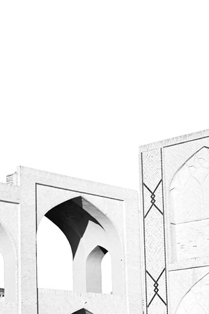 in iran the old mosque and traditional wall tile incision near minaretの写真素材