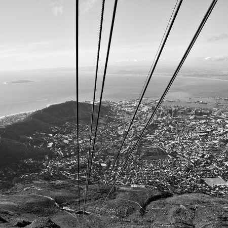 blur  in south africa cape town  city skyline from table mountain sky ocean and houseの写真素材
