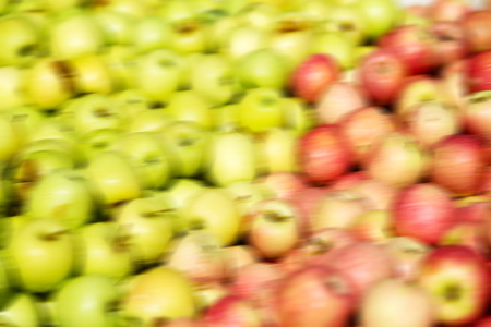 blur  in south africa market red and yellow apples in the natural  lightの写真素材