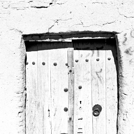iran old wooden  door and wall in the houseの写真素材