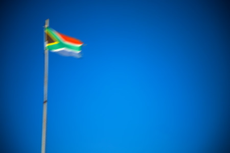 in south africa close up of the blur  national flag on poleの写真素材