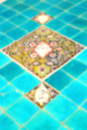 blur in iran the old decorative flower tiles from antique mosque like backgroundの写真素材