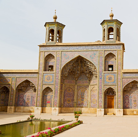in iran the old   mosque and traditional wall tile incision near minaretの写真素材