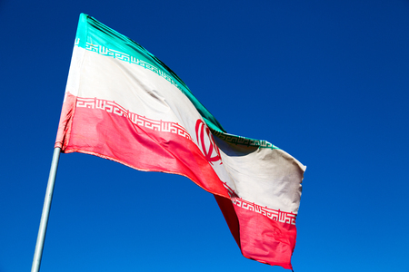 in iran blur  iranian waving flag  the blue sky and windの写真素材
