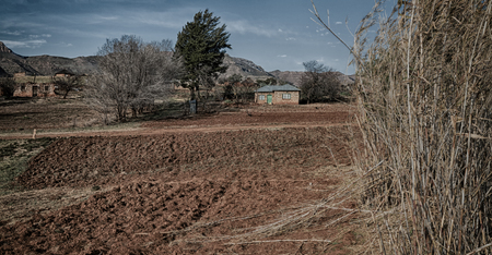blur  in lesotho malealea street village near  mountain and coultivation fieldの写真素材