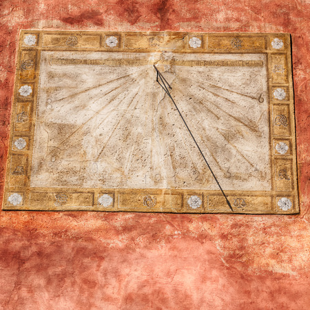 in italy sundial and gnomon antique historical medieval decoration wallの写真素材