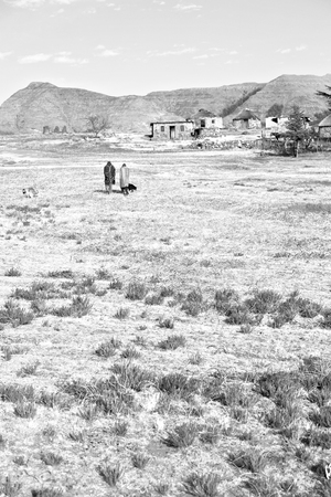 blur  in lesotho malealea street village near  mountain and coultivation fieldの写真素材