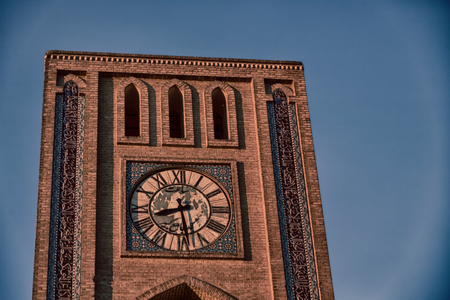 in iran old yazd city and  the antique brick    clock  tower near the skyの写真素材