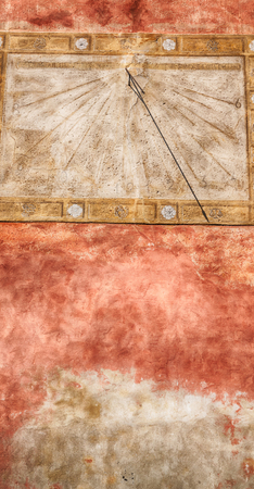 in italy sundial and gnomon antique historical medieval decoration wallの写真素材