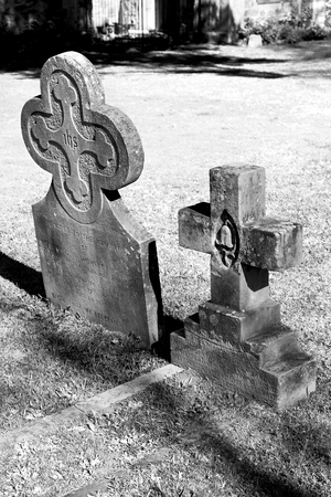 blur  in  south africa  cape town antique  grave cemetery cross stone and grassの写真素材