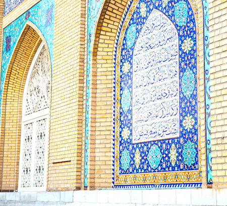 blur in iran the old decorative flower  tiles from antique mosque like backgroundの写真素材