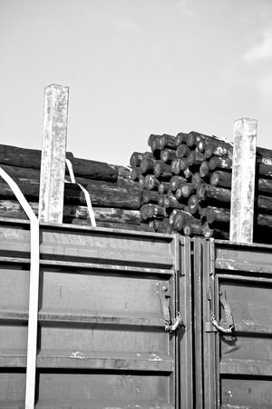 blur in south africa truck full of forest wood dirt and dustの写真素材