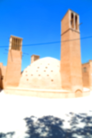 in blur  iran   yazd  the old  wind tower construction  used to frozen water and iceの写真素材