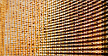 a wall build on wicker bamboo like abstract vintage surfaceの写真素材
