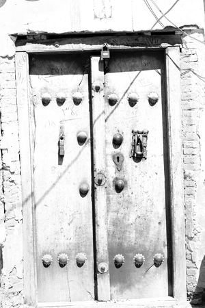 blur in iran old door near the mosque and antique constructionの写真素材