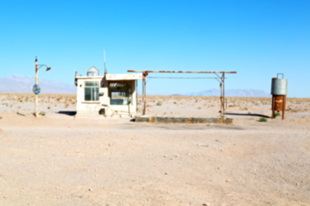 blur in iran old gas station  the desert mountain background and nobodyの写真素材