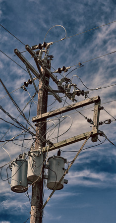 blur  in  philippines   a electric pole with transformer and wire  the cloudy sky