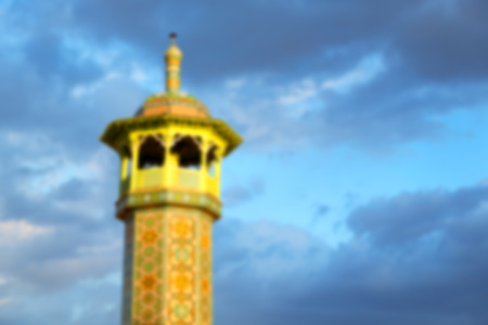 blur in iran  islamic mausoleum old   architecture mosque  minaret near the skyの写真素材