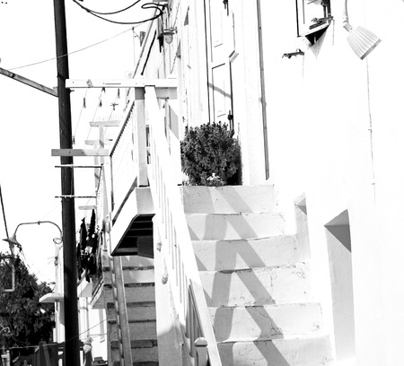 in the greece island window and door white  colors  old architectureの写真素材