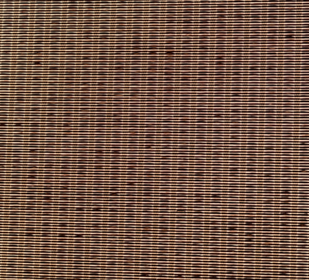 a wall build on wicker bamboo like abstract vintage surfaceの写真素材