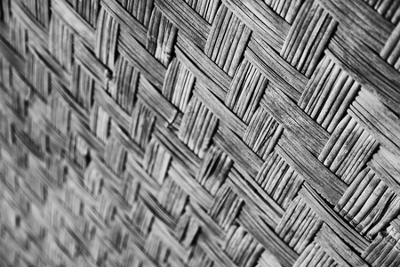 a wall build on wicker bamboo like abstract vintage surfaceの写真素材