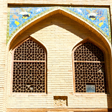 blur in iran the old decorative flower  tiles from antique mosque like backgroundの写真素材