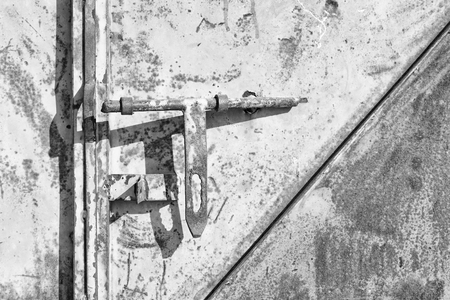 antique metal lock door in a old home concept of safetyの写真素材