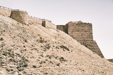 in jordan the old caste of ash shubak and his tower in the skyの写真素材