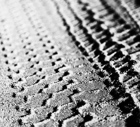 in the desert   track of car and truck in the sand like abstract backgroundの写真素材