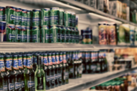 full of colors blurred in the supermarket like shopping background conceptの写真素材