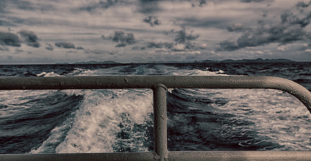 blur  in  philippines   a view from  boat  and the pacific ocean  mountain background