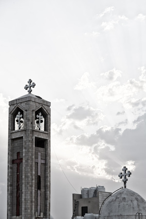 in amman jordan the chatolic church in the light of cloudy sunsetの写真素材