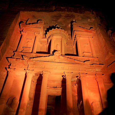 the antique site of petra in jordan the beautiful wonder of the world at nightの写真素材