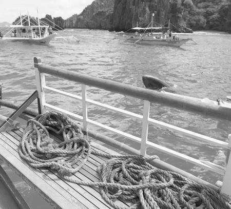 blur  in  philippines   view of the island hill from the prow of a boatの写真素材