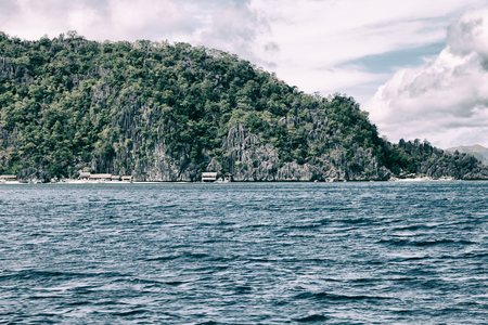 from a boat  in  philippines  snake island near el nido palawan beautiful panorama coastline sea and rockの写真素材