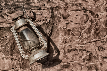 in the rock desert of jordan an antique old fashioned lamp isolatedの写真素材