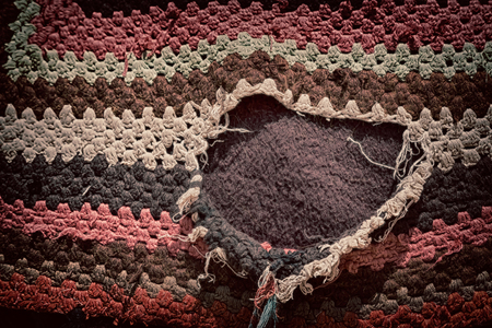 abstract texture of a colorful blanket patchwork like background