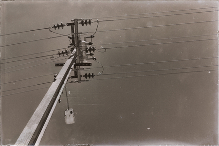 in  australia the concept of power line with electrical pole in the clear sky