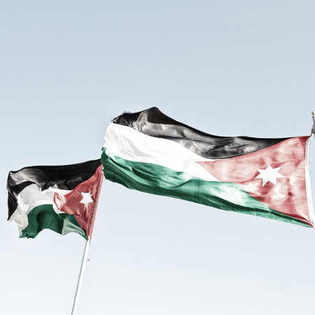 in jordan the national flag in the wind and skyの写真素材