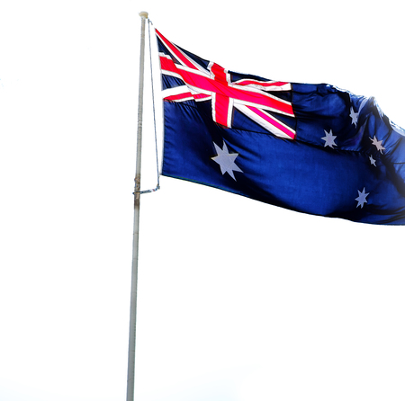 australia in the clear sky  the waving flagの写真素材