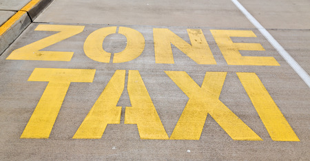 in australia. the line painted in the asphalt information for the taxy zoneの写真素材