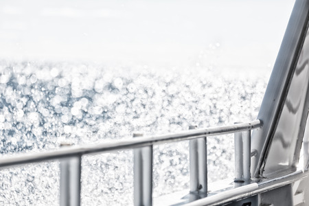 in australia the bokeh of light from the railings  boat and oceanの写真素材