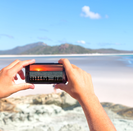 smartphone in australia the beach of Whitsunday Island like paradise concept and relaxの写真素材