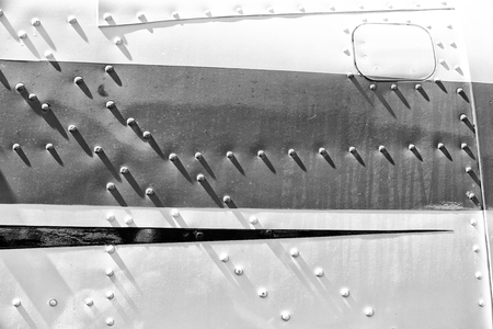 abstract texture background of the metallic rivet airplane  の写真素材