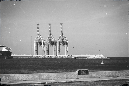 in oman muscar the port and the crane in the harbor near the skyの写真素材