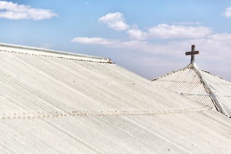 the cross in the old church and empty skyの写真素材
