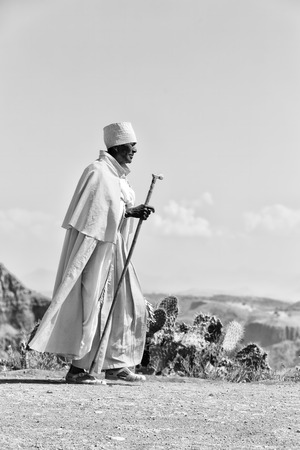  ETHIOPIA,LALIBELA-CIRCA  DECEMBER 2017--unidentified priest walking in the street  のeditorial素材