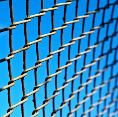 abstract texture of a metal grid surface   like background in the skyの写真素材
