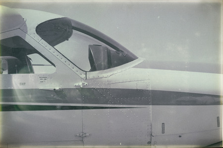 in crains austalia  window of little popular   plane parking in the airport