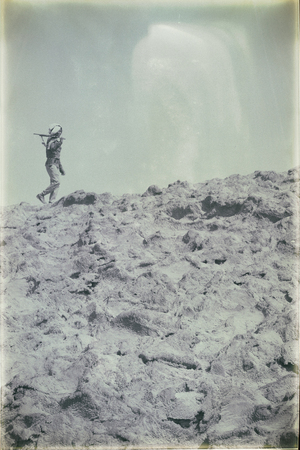 ETHIOPIA,DANAKIL-CIRCA  JANUARY 2018--unidentified   soldiers walking in the boarder  rockのeditorial素材